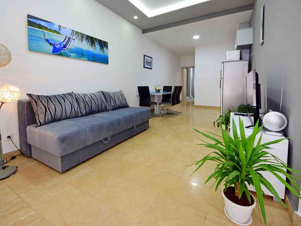 Plant, Property, Furniture, Blue, Comfort, Couch, Building, Lighting, Interior Design, Houseplant