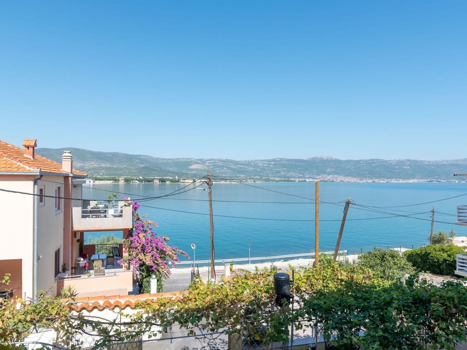Sky, Water, Plant, Flower, Building, Azure, Lake, Coastal And Oceanic Landforms, Window, House