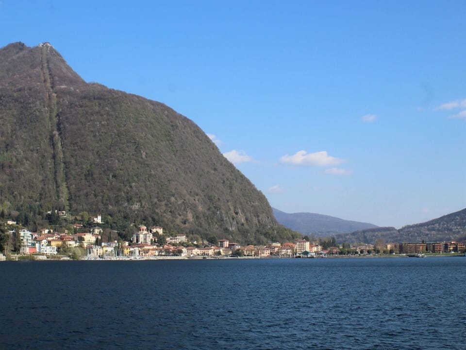 Water, Sky, Mountain, Water Resources, Cloud, Azure, Highland, Lake, Coastal And Oceanic Landforms, Bank