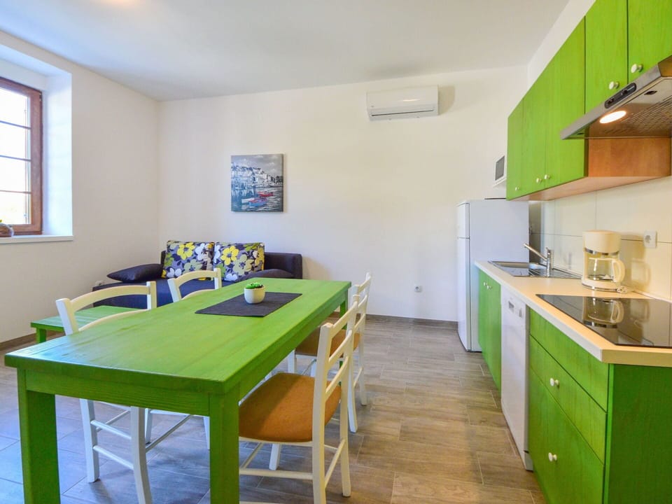 Furniture, Cabinetry, Property, Window, Countertop, Table, Green, Kitchen Appliance, Lighting, Interior Design