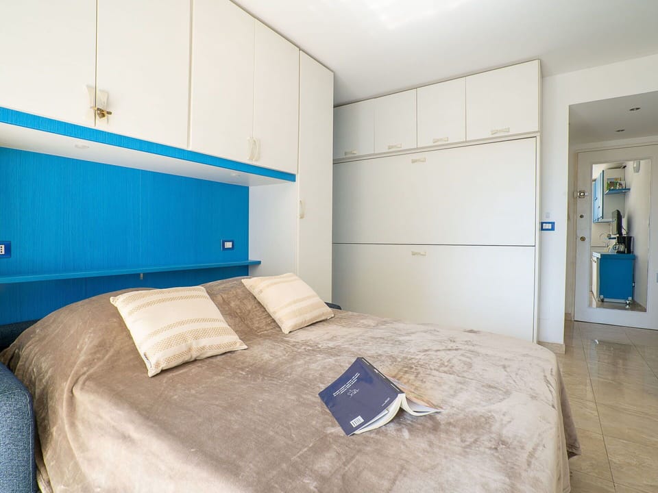 Blue, Azure, Textile, Comfort, Building, Wood, Cabinetry, Flooring, Floor, Bed