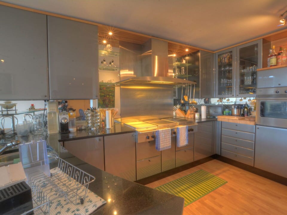Countertop, Cabinetry, Property, Building, Kitchen, Kitchen Stove, Kitchen Appliance, Wood, Interior Design, Home Appliance
