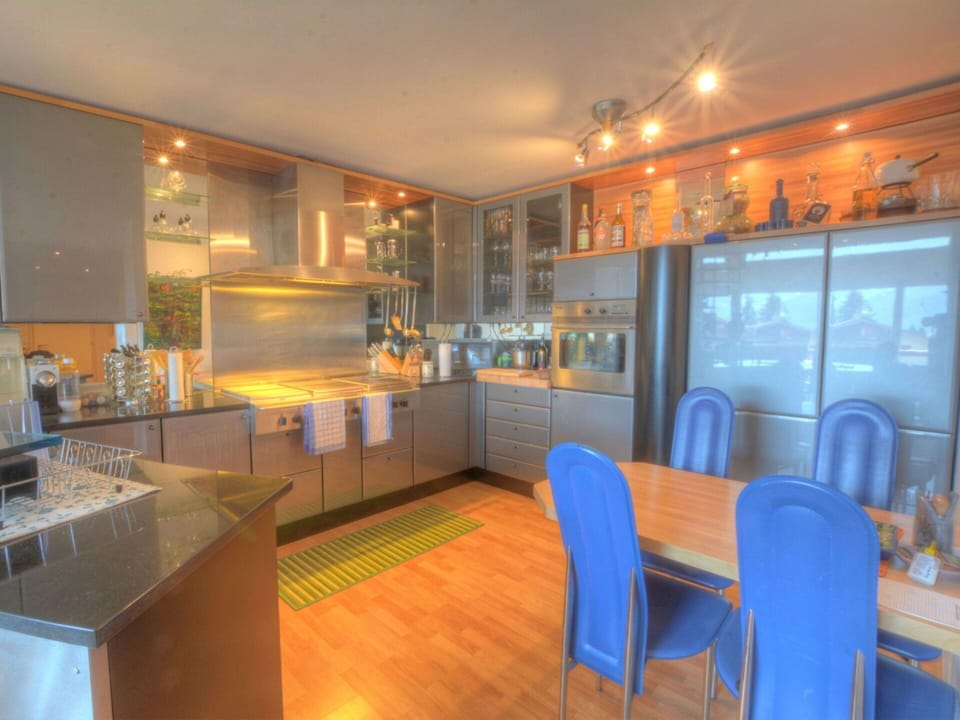 Furniture, Cabinetry, Countertop, Chair, Architecture, Interior Design, Wood, Kitchen, Flooring, Barware