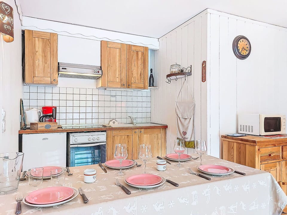 Furniture, Kitchen, Interior Design, Wood, Kitchen Appliance, Countertop, Major Appliance, Cabinetry, Room, Flooring
