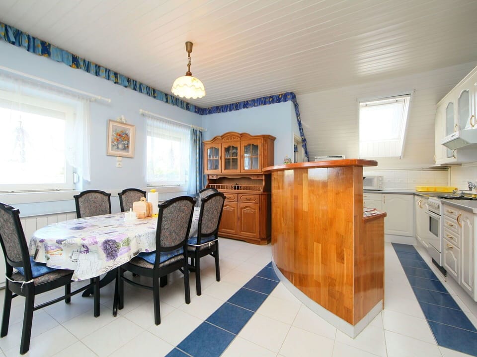 Cabinetry, Furniture, Countertop, Building, Window, Chair, Flooring, Wood, Table, Kitchen