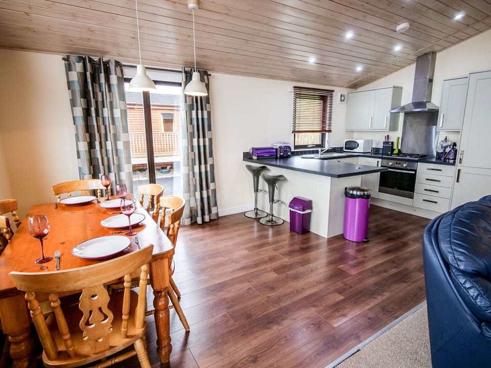 Furniture, Table, Cabinetry, Countertop, Wood, Flooring, Floor, Chair, Kitchen, Hardwood