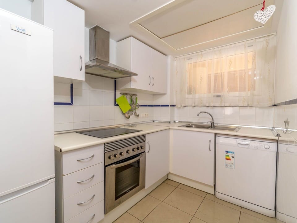 Cabinetry, Countertop, Property, Sink, Building, Kitchen Stove, Kitchen Sink, Tap, Product, Kitchen