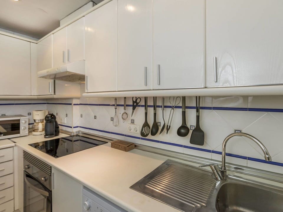 Kitchen, Countertop, Kitchen Appliance, Major Appliance, Flooring, Interior Design, Cabinetry, Kitchen Sink, Plumbing Fixture, Sink