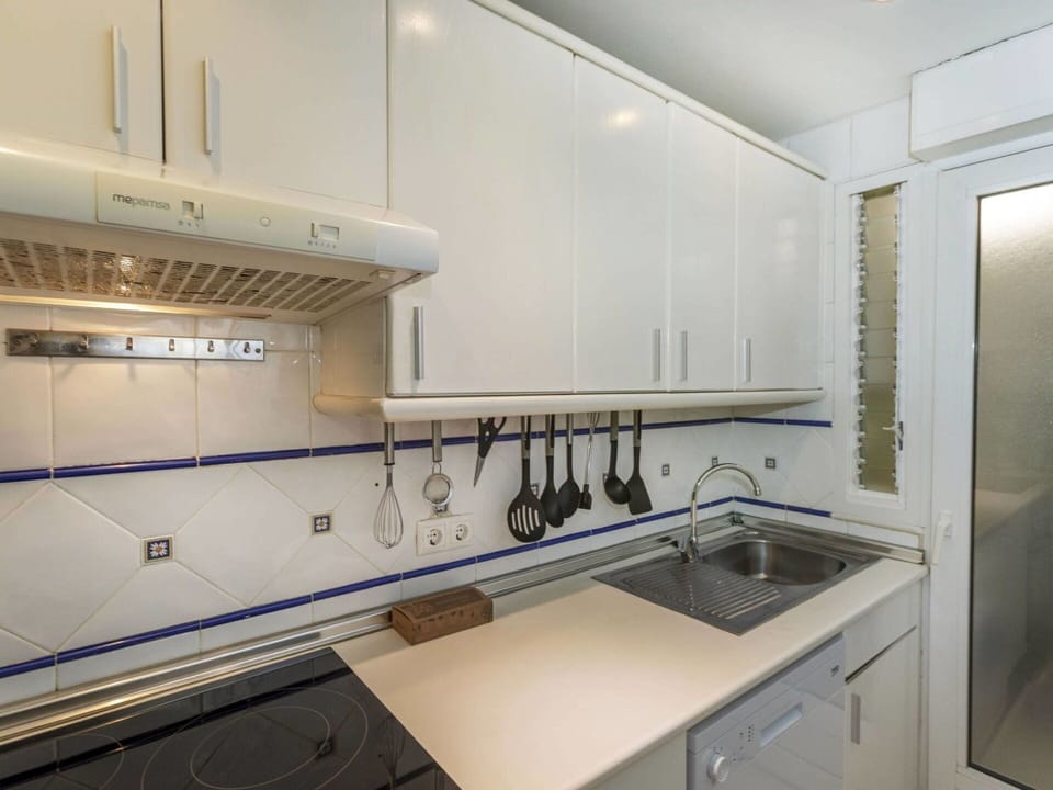 Kitchen, Countertop, Major Appliance, Kitchen Appliance, Flooring, Interior Design, Kitchen Sink, Cabinetry, Plumbing Fixture, Kitchen Stove