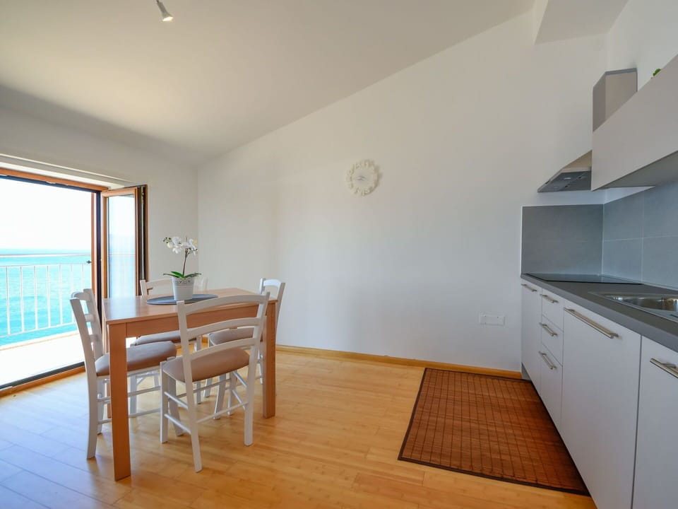 Property, Furniture, Cabinetry, Building, Wood, Flooring, Countertop, Floor, Interior Design, Wood Stain