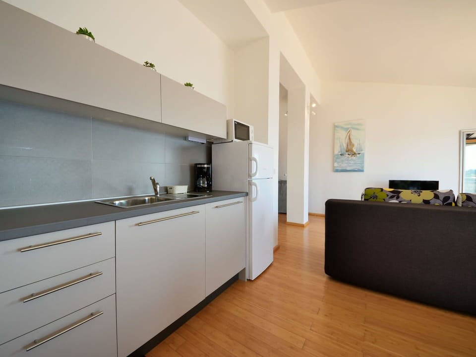 Cabinetry, Countertop, Furniture, Tap, Kitchen Stove, Drawer, Building, Kitchen Appliance, Kitchen, Interior Design