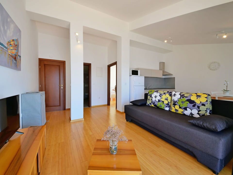Furniture, Comfort, Wood, Flooring, Floor, Interior Design, Couch, House, Television, Laminate Flooring