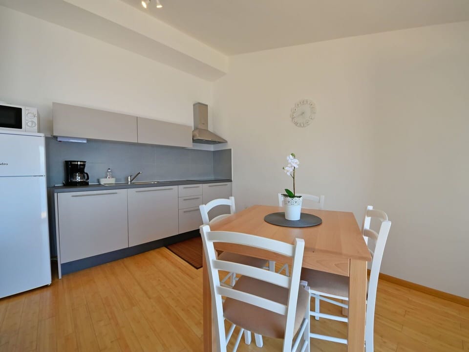 Cabinetry, Property, Furniture, Countertop, Wood, Interior Design, Sink, Flooring, Kitchen Appliance, Floor