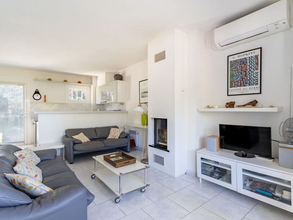 Property, Furniture, Picture Frame, Couch, Living Room, Interior Design, Home Appliance, Floor, Flooring