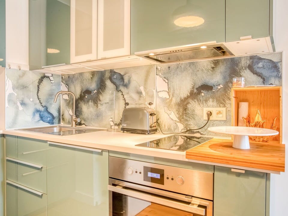 Countertop, Cabinetry, Property, Furniture, Wood, Kitchen, Drawer, Interior Design, Wood Stain, Floor
