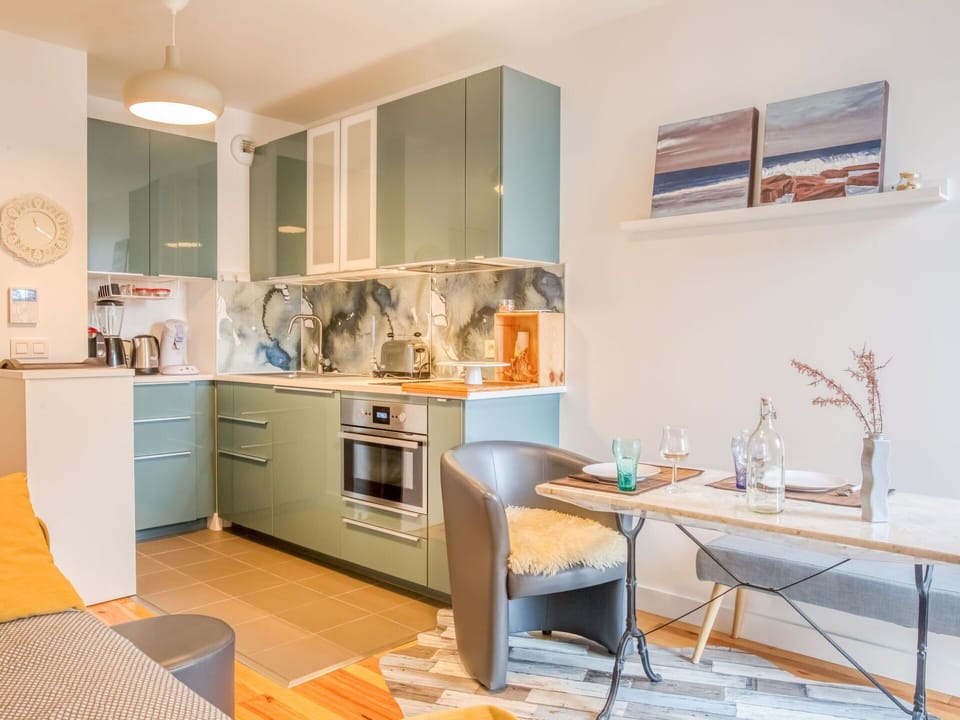 Cabinetry, Furniture, Property, Countertop, Table, Building, Chair, Kitchen, Azure, Wood