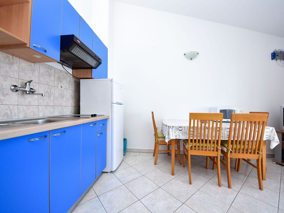 Furniture, Cabinetry, Property, Table, Chair, Building, Azure, Tap, Wood, Interior Design