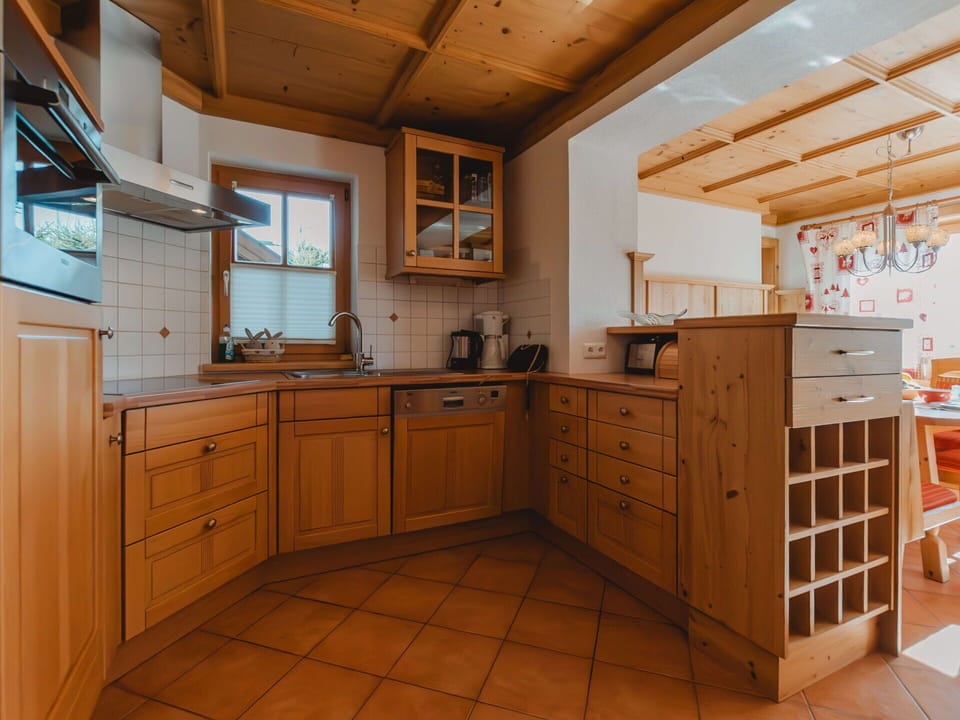 Cabinetry, Furniture, Property, Countertop, Drawer, Tap, Sink, Wood, Interior Design, Flooring