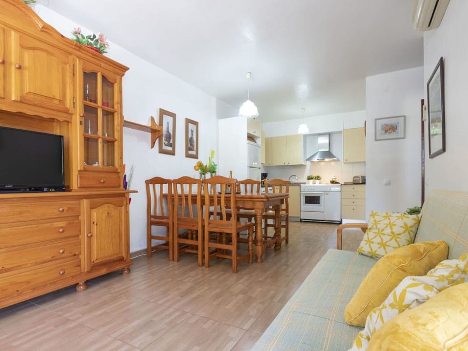 Table, Furniture, Cabinetry, Property, Wood, Building, Chair, Interior Design, Yellow, Drawer