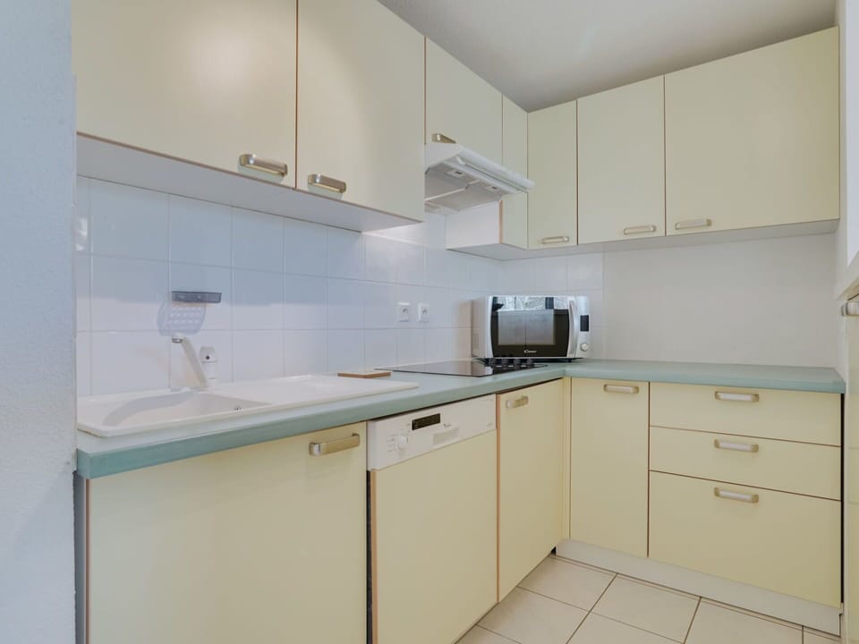 Countertop, Cabinetry, Kitchen Sink, Tap, Sink, Kitchen Stove, Kitchen, Kitchen Appliance, Wood, Drawer