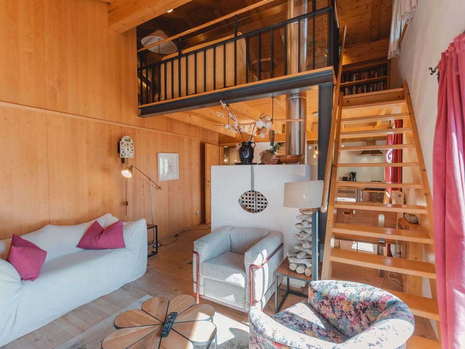 Furniture, Property, Picture Frame, Building, Comfort, Couch, Interior Design, Wood, Living Room, Bookcase