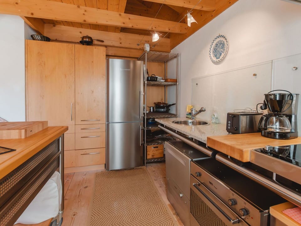 Cabinetry, Countertop, Property, Furniture, Kitchen Appliance, Home Appliance, Kitchen Stove, Drawer, Wood, Kitchen