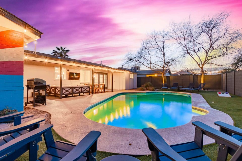 Your own private back yard oasis with pool, covered patio and turf
