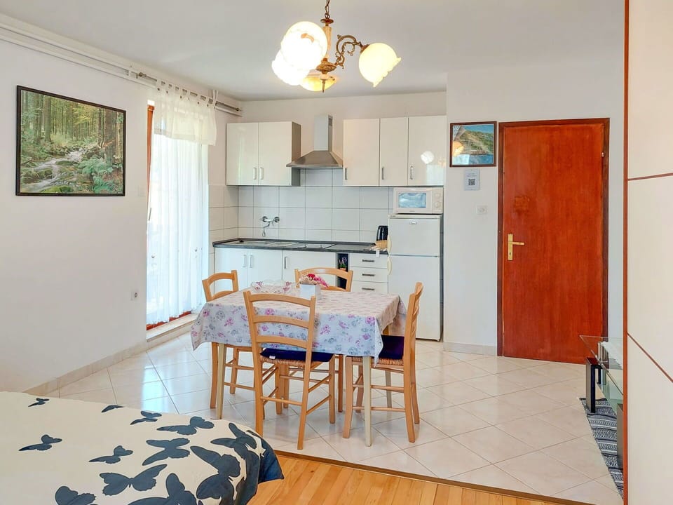 Furniture, Property, Table, Cabinetry, Picture Frame, Chair, Wood, Interior Design, Lighting, Countertop