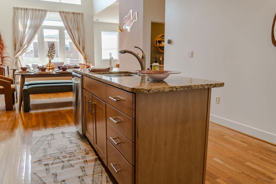 Kitchen: Open concept kitchen and living room space.