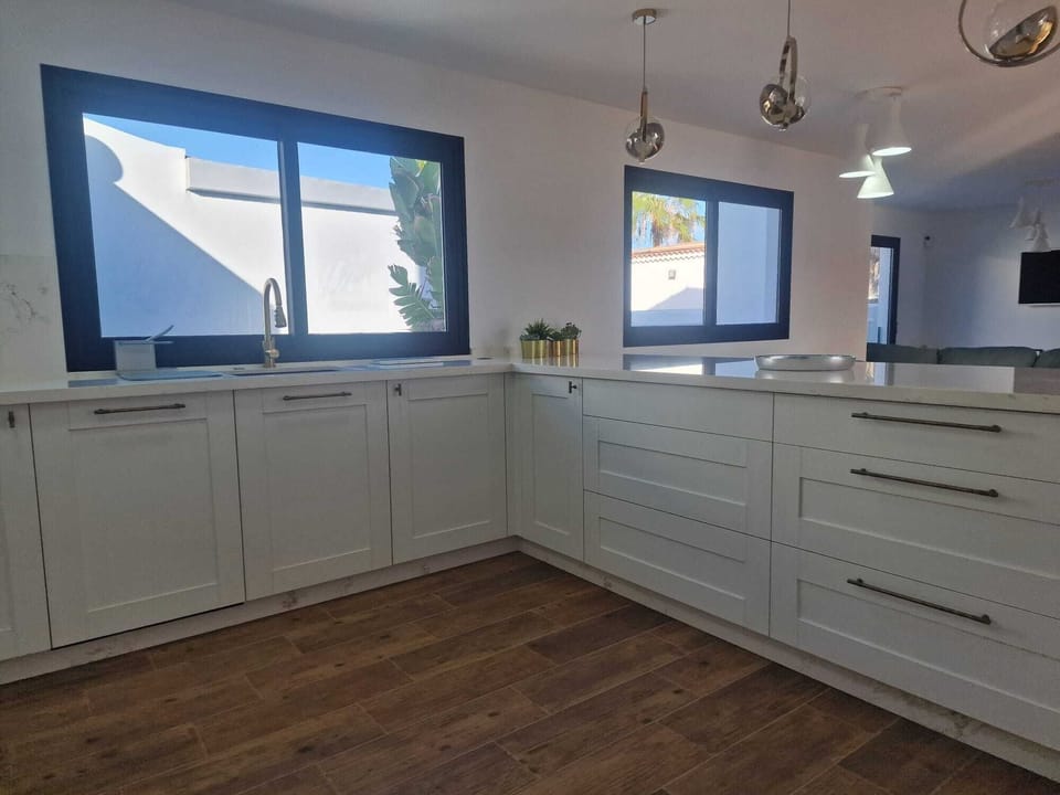 Large open plan kitchen overlooking the lounge area