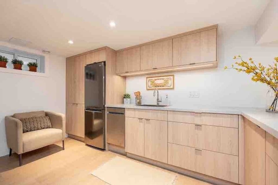 Kitchenette includes a dishwasher, Breville 3in1 oven, and full fridge.