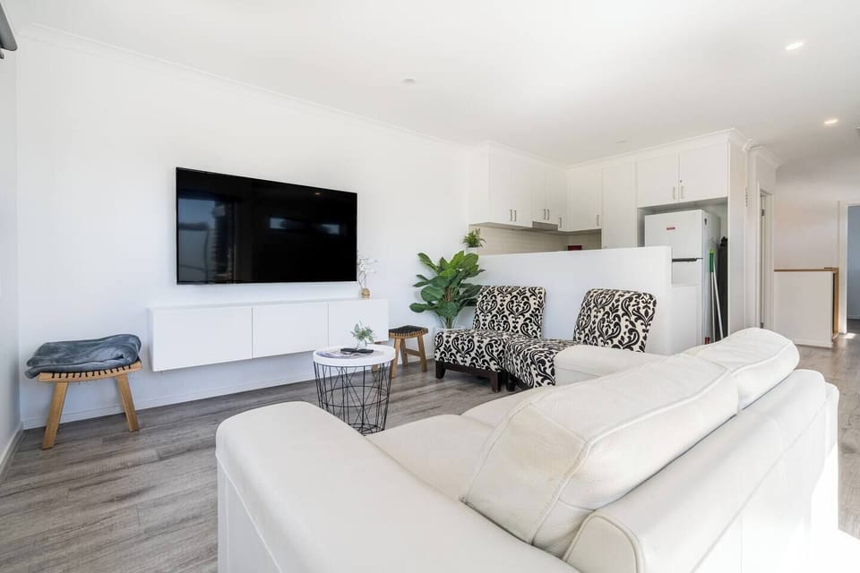 Enjoy a seamless open flow, where the living area effortlessly flows into the kitchen, perfect for entertaining.