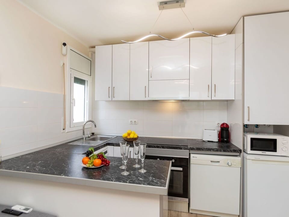 Cabinetry, Countertop, Sink, Property, Kitchen Sink, Tap, Kitchen Stove, Kitchen, Interior Design, Building