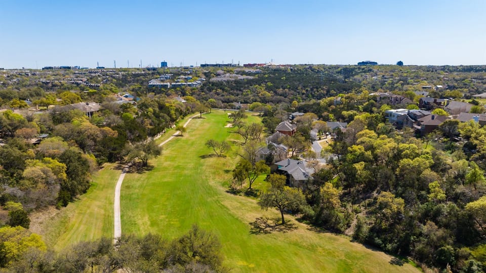 Aerial view landscape featuring houses and trees