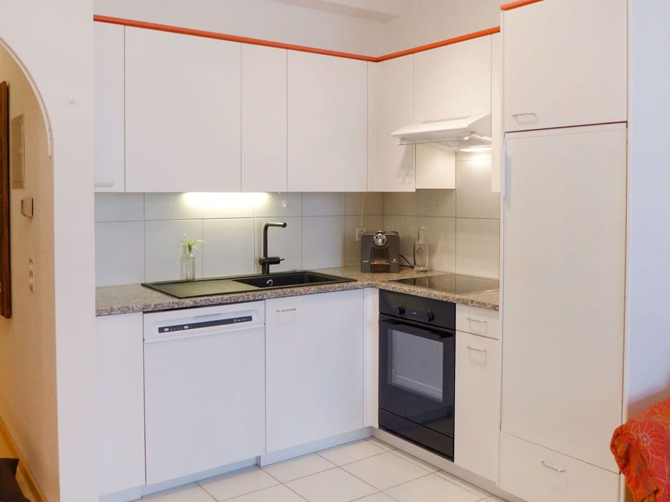 Cabinetry, Countertop, Sink, Kitchen Sink, Building, Kitchen Stove, Kitchen Appliance, Kitchen, Home Appliance, Wood