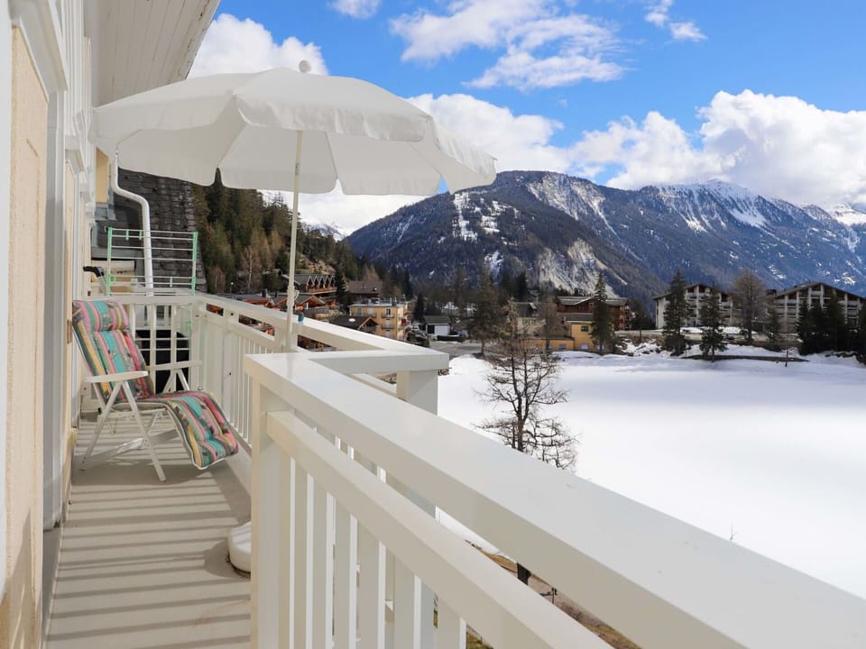 Cloud, Sky, Property, Azure, Umbrella, Building, Snow, Shade, Tree, Mountain