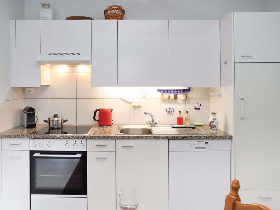 Cabinetry, Countertop, Property, Kitchen Sink, Kitchen Stove, Kitchen Appliance, Kitchen, Sink, Home Appliance, Tap