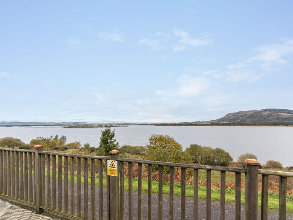 Water, Sky, Cloud, Plant, Fence, Land Lot, Lake, Horizon, Wood, Landscape