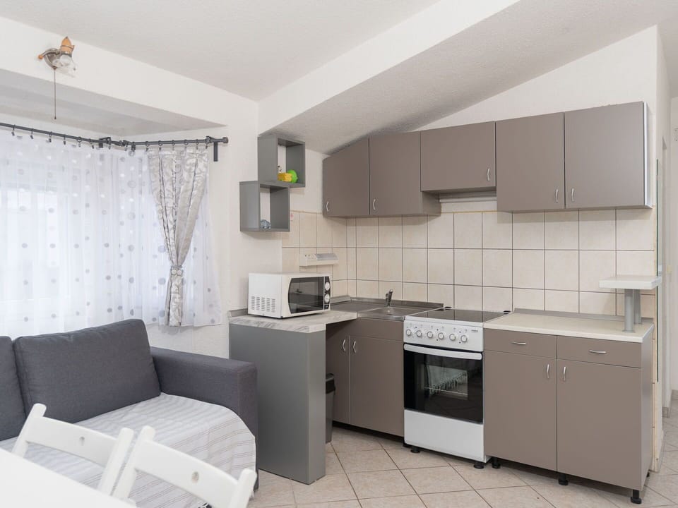Furniture, Interior Design, Floor, Flooring, Ceiling, Kitchen, Room, Apartment, Home, Major Appliance