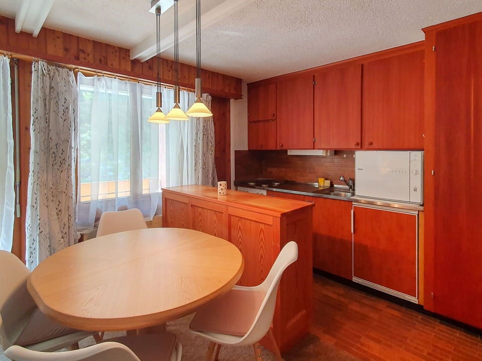 Cabinetry, Property, Table, Furniture, Window, Countertop, Chair, Wood, Plant, Interior Design