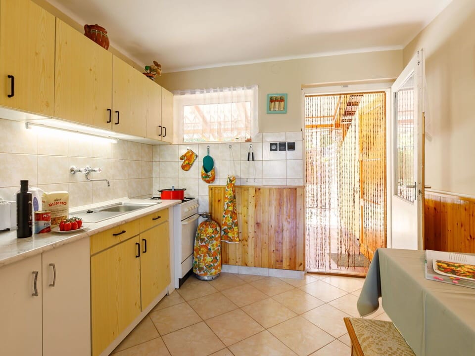 Cabinetry, Furniture, Countertop, Chair, Kitchen, Sink, Wood, Drawer, Kitchen Appliance, Interior Design