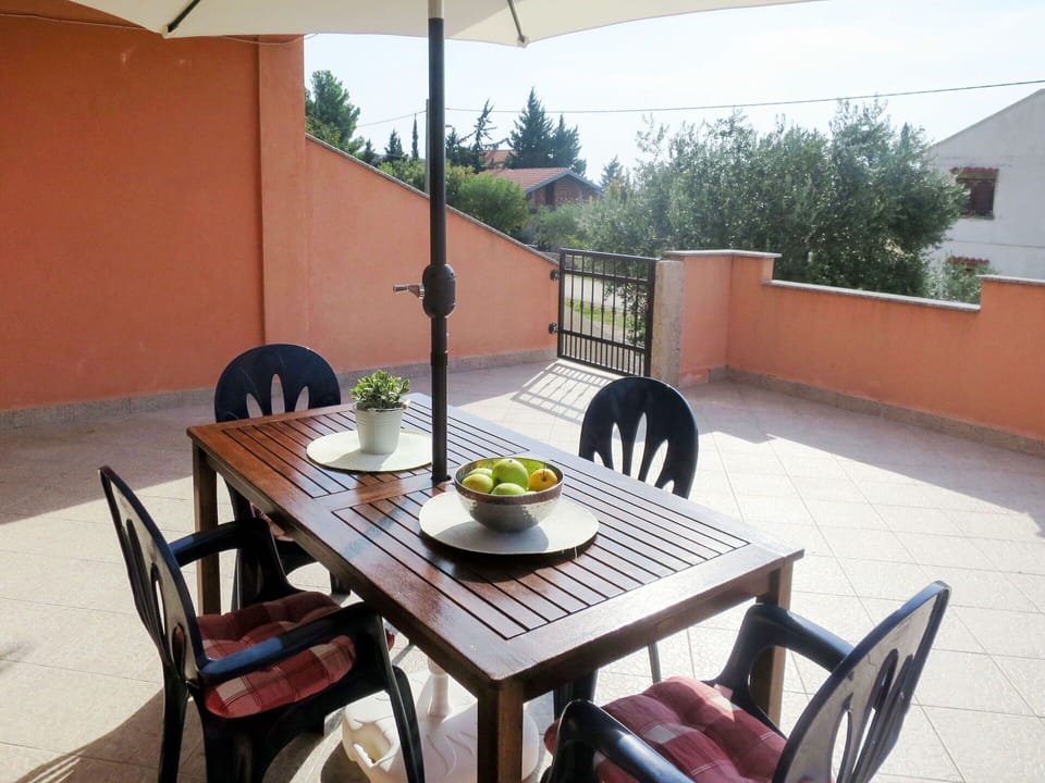 Table, Furniture, Property, Building, Chair, Outdoor Table, Window, Plant, Shade, Interior Design