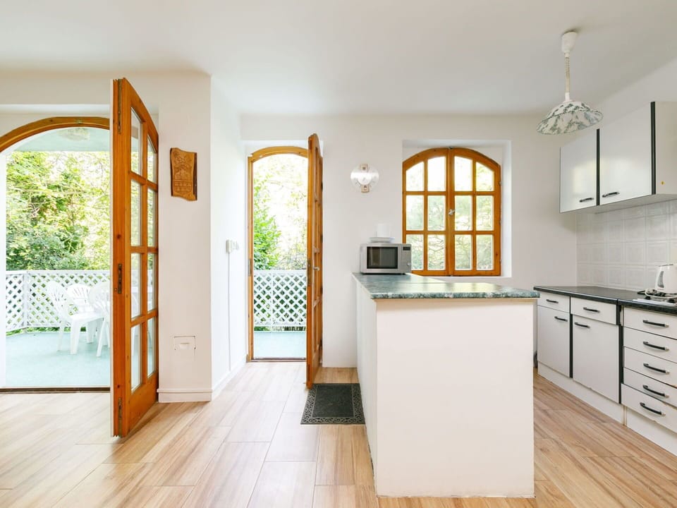 Cabinetry, Furniture, Window, Countertop, Building, Wood, Plant, Lighting, Interior Design