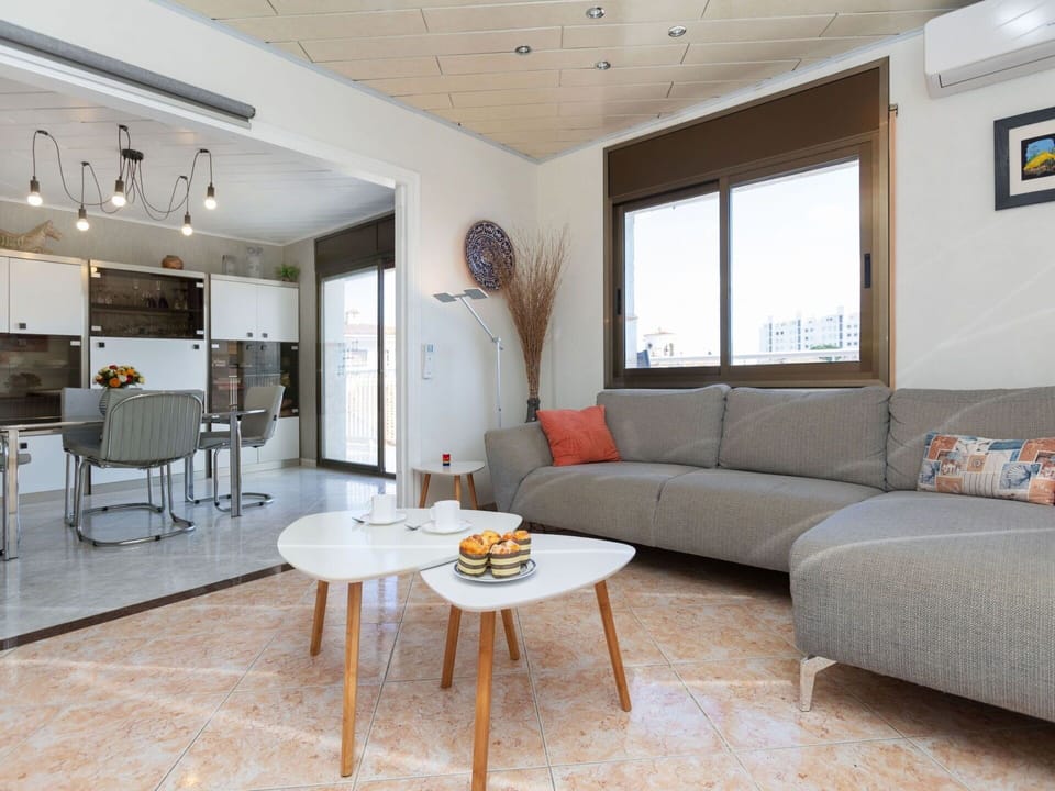 Furniture, Table, Property, Couch, Wood, Interior Design, Floor, Flooring, Picture Frame, Living Room