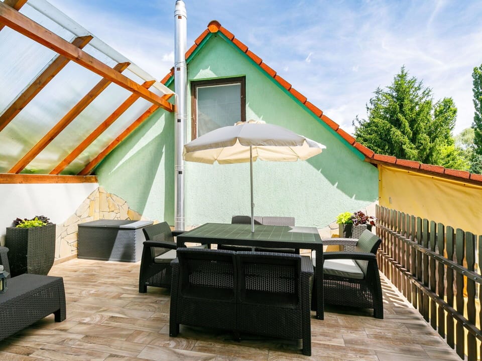 Sky, Property, Cloud, Shade, Outdoor Furniture, Architecture, Cottage, Wood, Table, Leisure