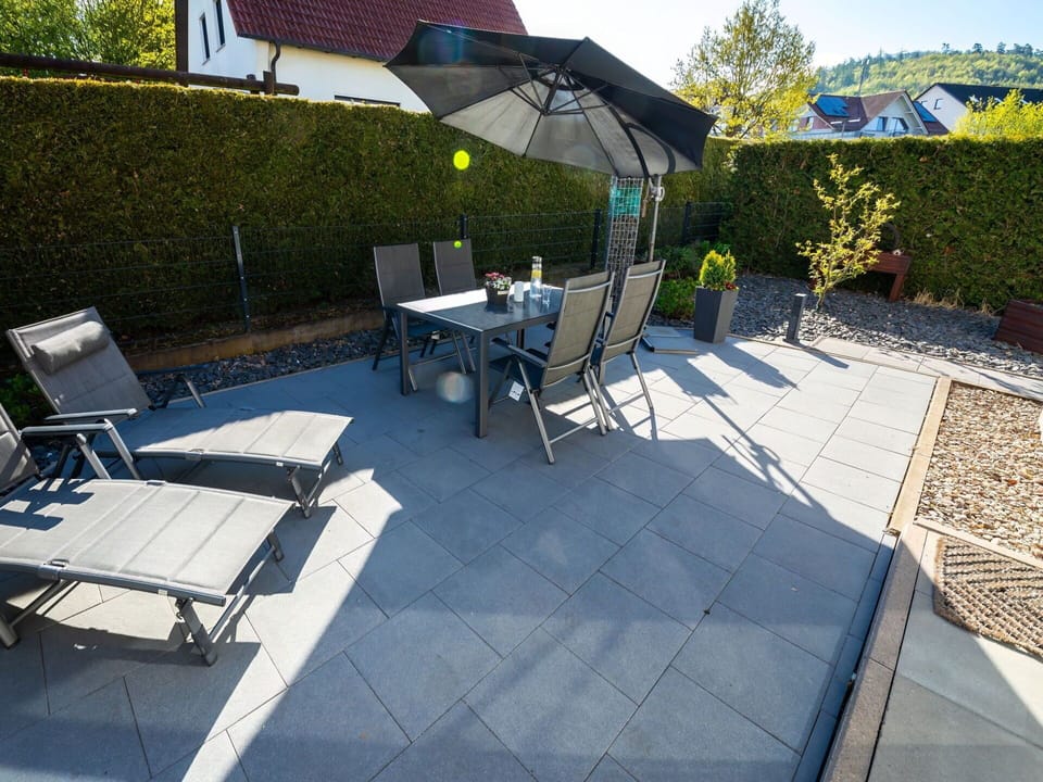 Furniture, Plant, Table, Shade, Outdoor Furniture, Building, Interior Design, Outdoor Table, Flowerpot, Leisure
