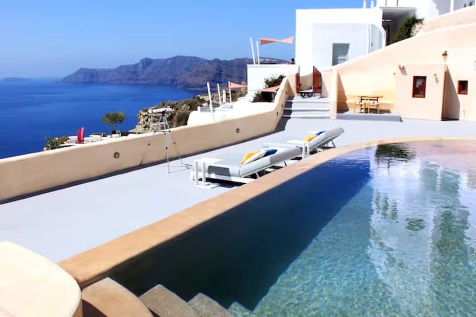 View of the terrace with outdoors seating area and sun loungers