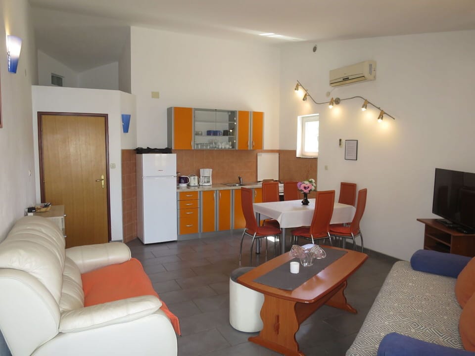 Furniture, Table, Property, Couch, Chair, Interior Design, Picture Frame, Comfort, Television, Wood