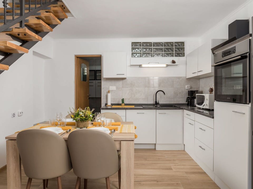 Furniture, Property, Comfort, Table, Azure, Plant, Building, Wood, Textile