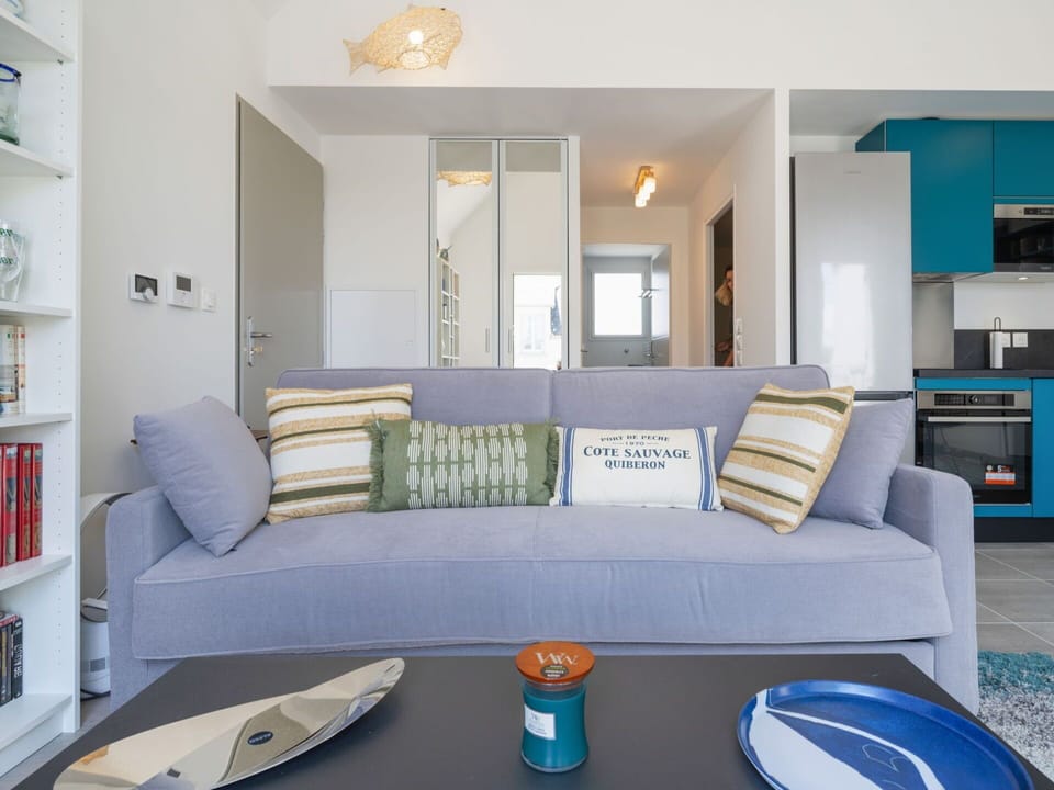 Couch, Property, Table, Picture Frame, Furniture, Comfort, Azure, Lighting, Studio Couch, Interior Design